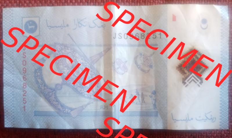 Banknote Malaysia (0010) Die Rückseite zeigt das Objekt, was auf der alten1er banknote auch zu sehen war. Allerdings nicht die Berglandschaft, sondern Menschen,... Sammlung